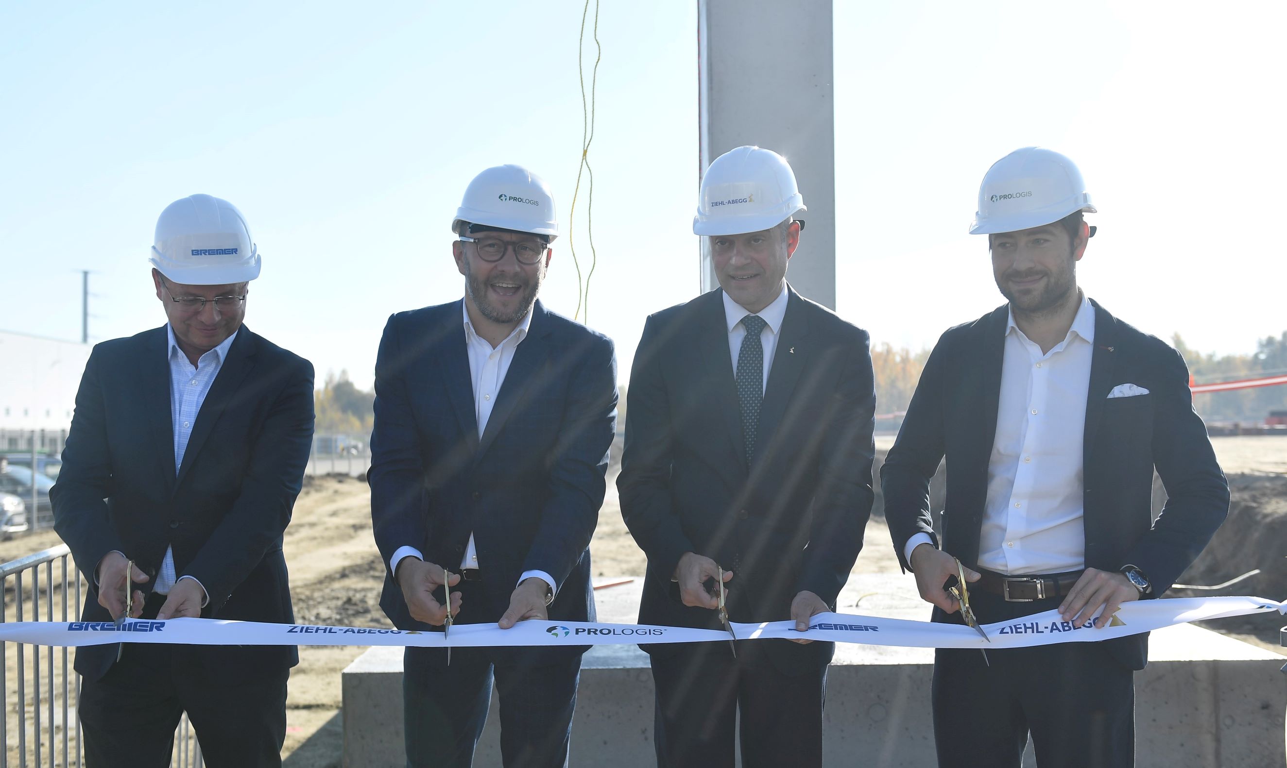 Four men on construction field