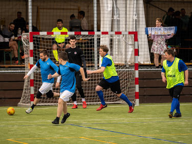 football players in blue and yellow shirts